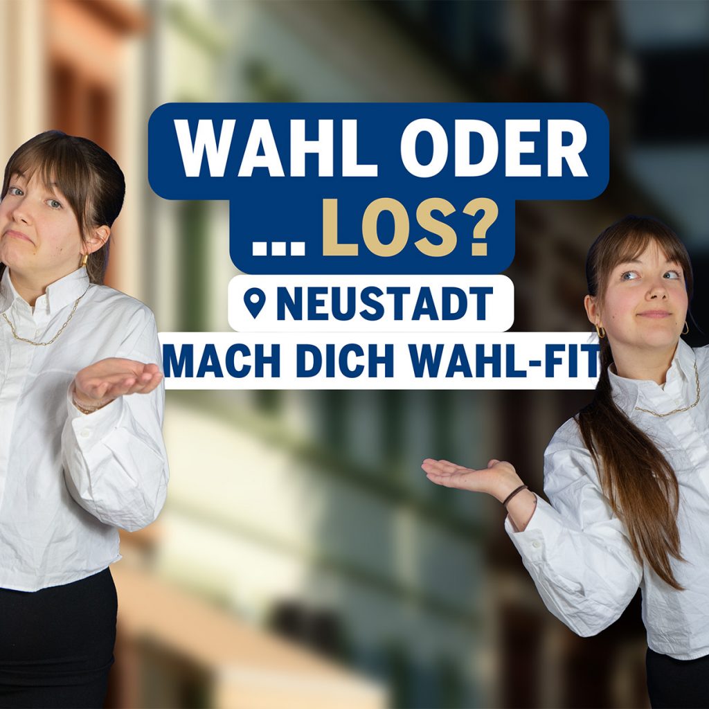 Ellie steht links und rechts im Bild und zeigen mit offenen Händen eine fragende Geste. In der Mitte befindet sich der Schriftzug „Wahl oder … los? Mach dich wahl-fit“. Im Hintergrund sind Fassaden in Neustadt an der Weinstraße.